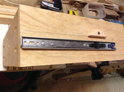 locking mechanisms for hidden drawers